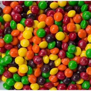 Skittles, made by Mars Wrigley, are colorful fruit-flavored candies with a crunchy shell and chewy center. Known for their vibrant colors and fruity taste, Skittles are a popular treat enjoyed by people of all ages around the world.
