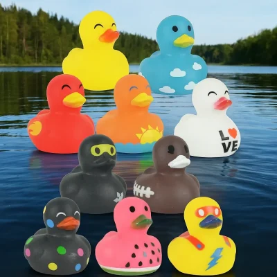 "Nine colorful rubber ducks with unique patterns and designs floating on a lake with trees in the background."
