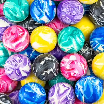Assorted 49mm two-color marble swirl hi-bounce balls in bright pink, yellow, blue, purple, green, and black bulk arcade prize balls