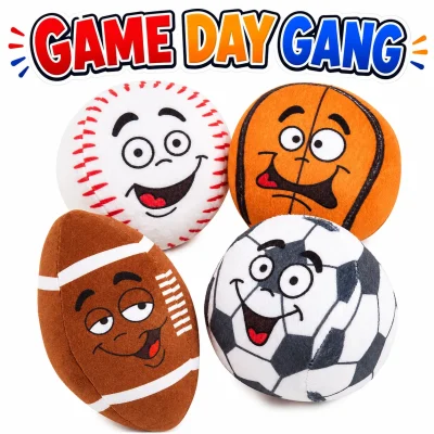 Game Day Gang plush sports ball collection featuring baseball, basketball, football, and soccer ball plush toys with funny cartoon faces beneath a colorful sports-themed title on a clean white background.