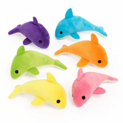 "Six neon plush dolphin toys in purple, blue, orange, green, yellow, and pink arranged in a circle on a white background – bulk arcade crane prizes."