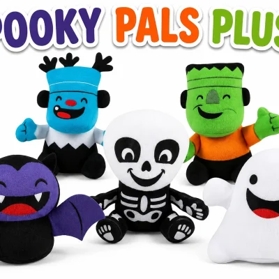 Spooky Pals Plush assortment featuring smiling ghost, skeleton, vampire bat, Frankenstein, and blue monster plush toys on a white background for crane machines, arcades, and prize redemption games.