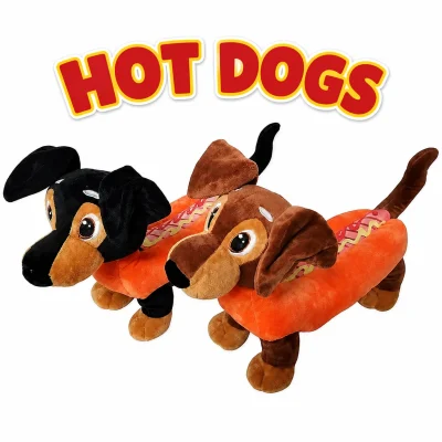 "Two oversized plush dachshund dogs dressed as hot dogs displayed on a clean white background beneath a bold 'HOT DOGS' title. Features one black-and-tan dachshund and one brown-and-tan dachshund wearing plush hot dog bun costumes with mustard and ketchup detailing. Ideal for claw machines, arcade prizes, redemption counters, amusement centers, and novelty plush displays."