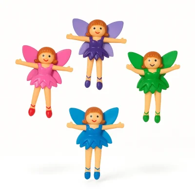 "Set of four colorful vinyl fairy bendable toys in pink, purple, blue, and green outfits with matching wings, displayed on a white background."
