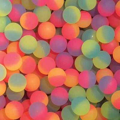 32mm icy rubber bouncy balls with frosted texture in assorted two-tone colors, perfect for vending machines, party favors, and arcade prizes.
