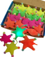 Flashing Puffer Stars in assorted colors, light-up toys in a 480-piece bulk box, perfect for redemption counters and crane machines.