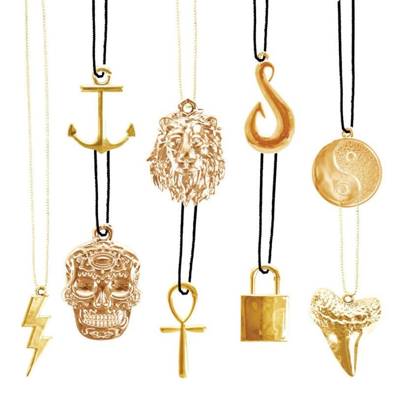 Gold Jewelry Collection in 2-inch capsules, featuring 9 unique designs like anchor, skull, lion, and ankh for bulk vending and crane games.