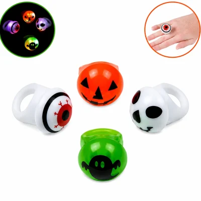 Flashing Light-Up Halloween Rings with pumpkin, ghost, eyeball, and spooky face designs, featuring glow-in-the-dark effect and ring size demonstration on a white background.