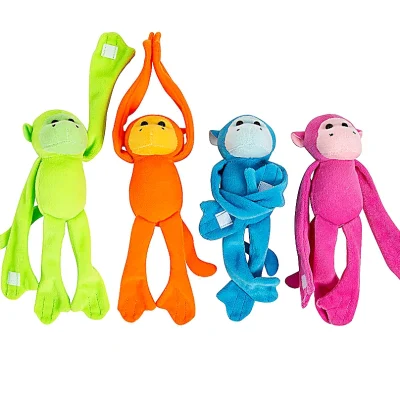 Assorted Bright Long Arm Monkey Plush Toys In Green, Orange, Blue, And Pink On A Clean White Background