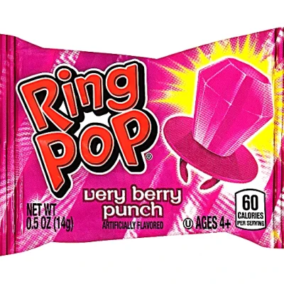 A single Ring Pop Very Berry Punch candy in bright magenta packaging, featuring a large magenta gem-shaped candy illustration and nutrition information on the wrapper.