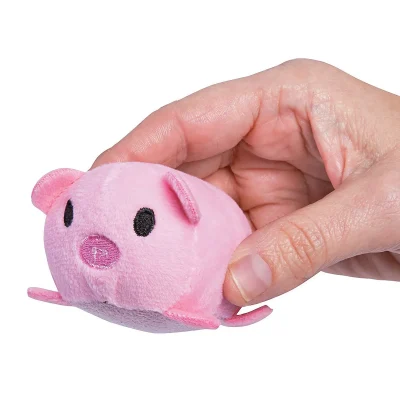 "Small pink plush pig toy held in a person's hand, designed as a cute farm animal stuffed animal for vending, prizes, or party favors."