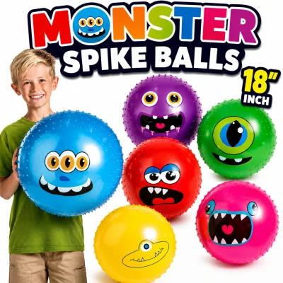 Monster Spike Balls 18-inch inflatable vinyl balls with colorful monster faces and child holding a giant blue monster ball for size comparison. Oversized novelty balls for claw machines, arcade prizes, redemption games, carnivals, party favors, and family entertainment centers.