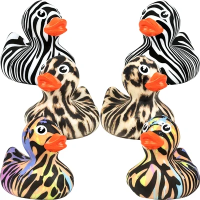 Set of six animal-print rubber ducks with zebra, cheetah, and rainbow safari designs, each with orange beaks, displayed on a white background.