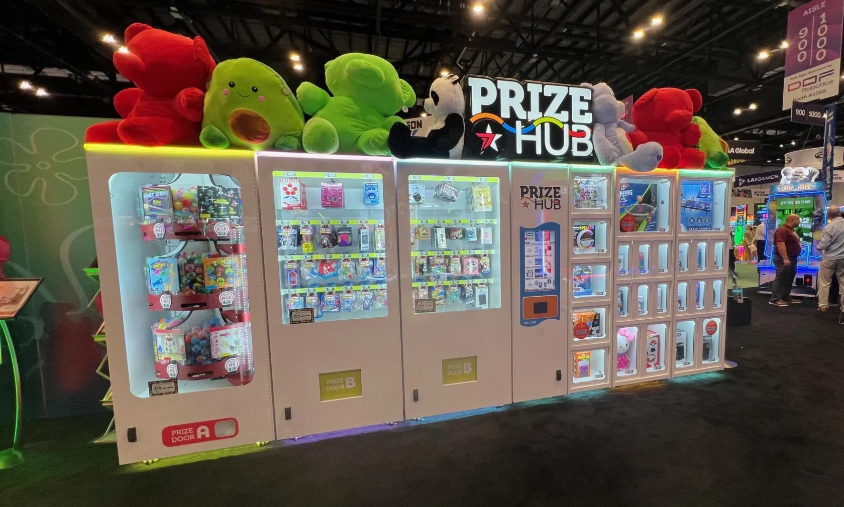 Prize wall with plush, capsules, and boxed items for claw and redemption machines