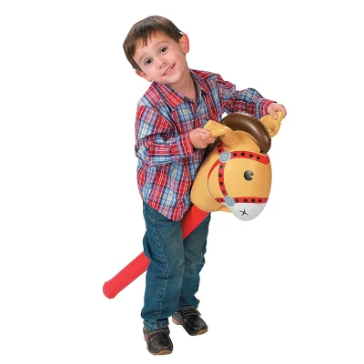 Child Playing With Inflatable Stick Horse Toy For Pretend Riding And Active Play