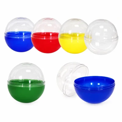 2.5-inch empty round polypropylene (PP) capsules with clear tops and assorted colored bottoms, including blue, red, yellow, green, and clear options, displayed on a white background for gashapon machines, capsule vending, and prize vending.