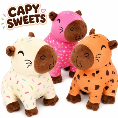 "Three dessert-themed capybara plush toys displayed on a clean white background with a chocolate-brown 'CAPY SWEETS' title above. Features a vanilla sprinkle capybara, pink candy sprinkle capybara, and chocolate chip capybara plush. Ideal for claw machines, crane games, arcade prizes, redemption counters, and plush toy displays."