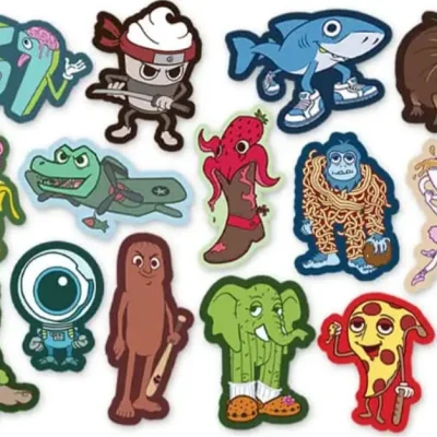 Italian Brain Rot collectible sticker set of 15 die-cut cartoon characters including shark, pizza, elephant cactus, ninja cupcake, astronaut eyeball, monkey banana, dinosaur plane, and octopus.
