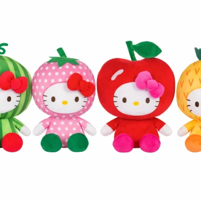 4.5-inch Hello Kitty fruit dress-up plush assortment showing four styles including watermelon, strawberry, apple, and pineapple designs on a clean white background, ideal for crane machine prizes