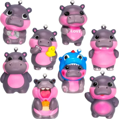 Assorted 2-inch squishy hippo toys with cute kawaii designs, including love heart, duck, dinosaur costume, and playful expressions, perfect for bulk vending machines, capsule toys, party favors, and prize redemption.