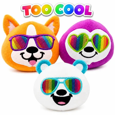 TOO COOL plush toy assortment featuring colorful animal plush heads wearing rainbow sunglasses, including an orange fox, purple sloth, and white bear on a white background with vibrant rainbow title above.