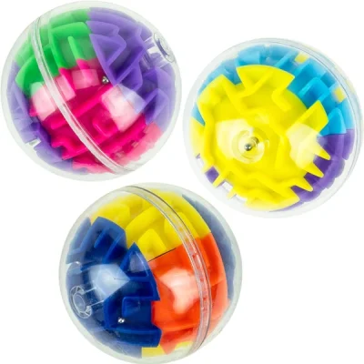 Assorted 2-inch Maze Balls puzzle capsules featuring colorful internal maze pieces in clear plastic spheres on a white background.