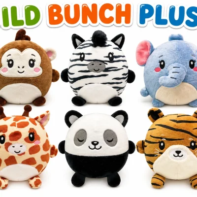 Wild Bunch Plush assortment featuring six round safari animal plush toys including monkey, zebra, elephant, giraffe, panda, and tiger on a clean white background.