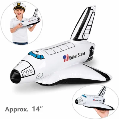 Inflatable Space Shuttle toy approximately 14 inches long with child and hand scale comparison on a white background, ideal for party favors, space-themed events, classroom rewards, carnival prizes, and redemption games.